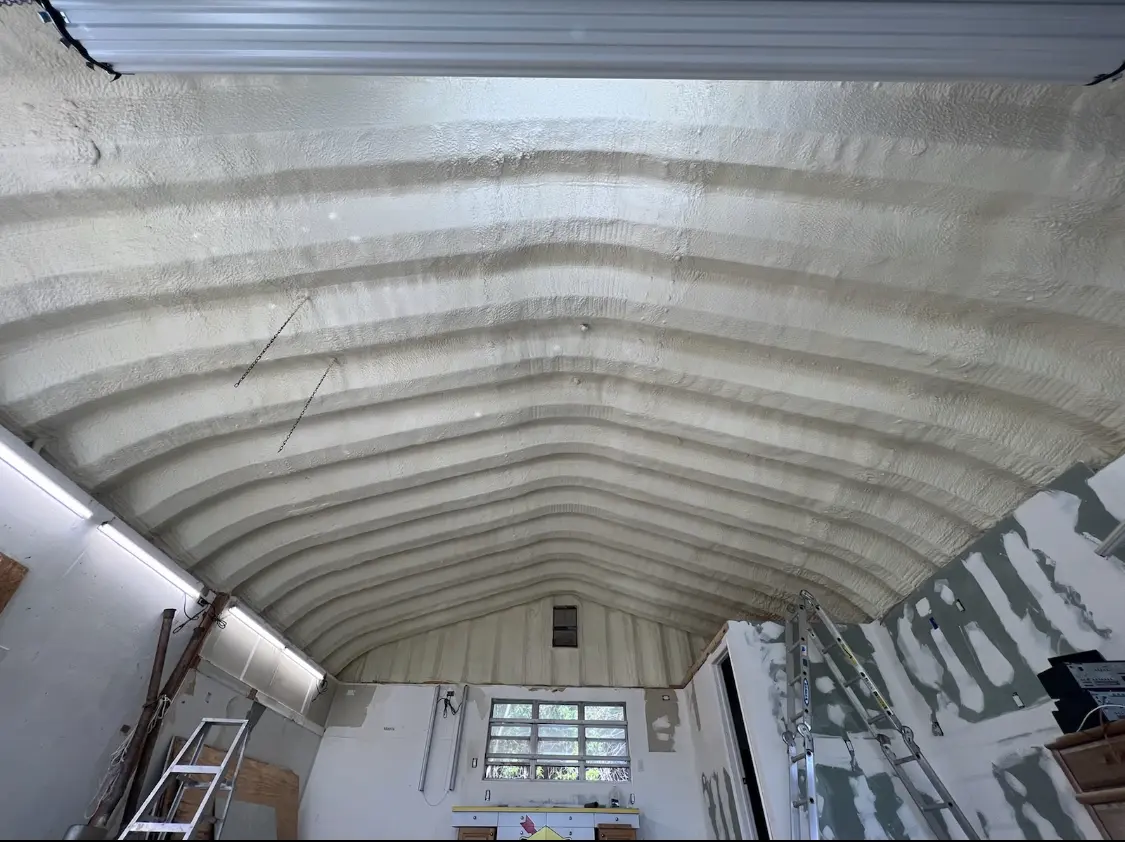 Spray polyurethane foam applied to the underside of a metal roof deck in Beverly Hills
